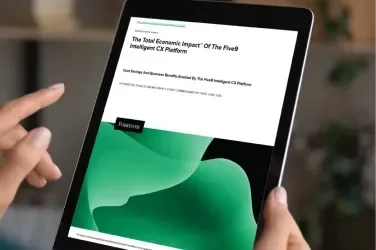 Hands holding a tablet displaying a document with green waves and text.