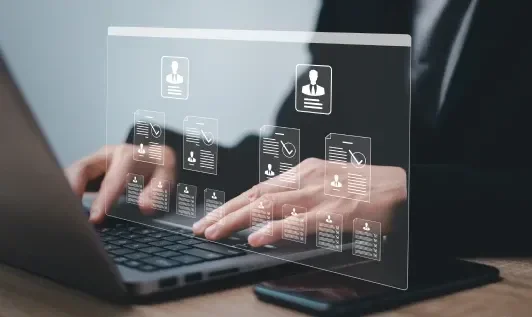 Man using laptop with visuals